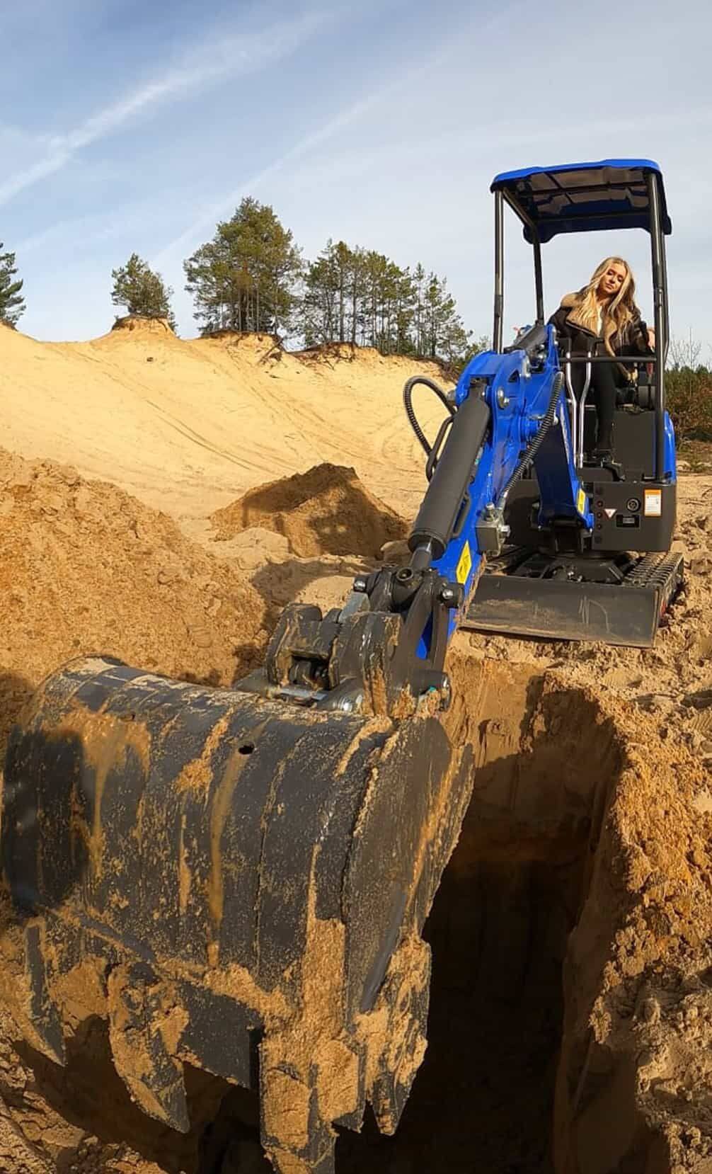 Excavator working on-site in Poland, demonstrating precise hydraulic control with smooth, responsive movement